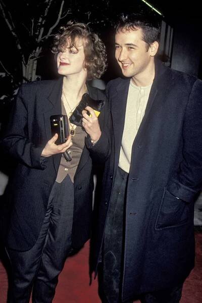 WESTWOOD, CA - DECEMBER 13: Joan Cusack and John Cusack attend the premiere of "Toys" on December 13, 1992 at the Avco Westwood Cinema in Westwood, California.