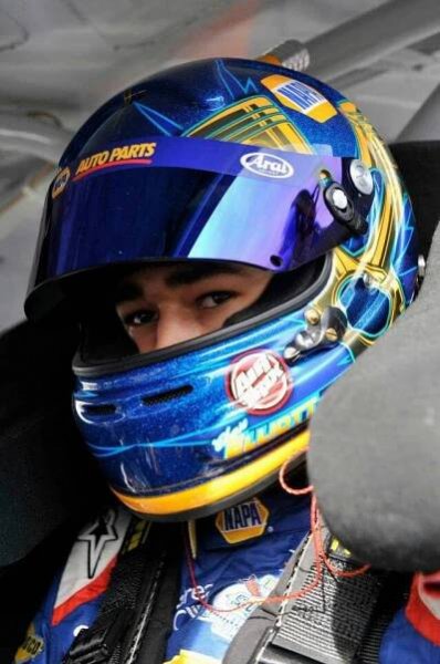 Professional NASCAR Driver Chase Elliott in Action Wallpaper