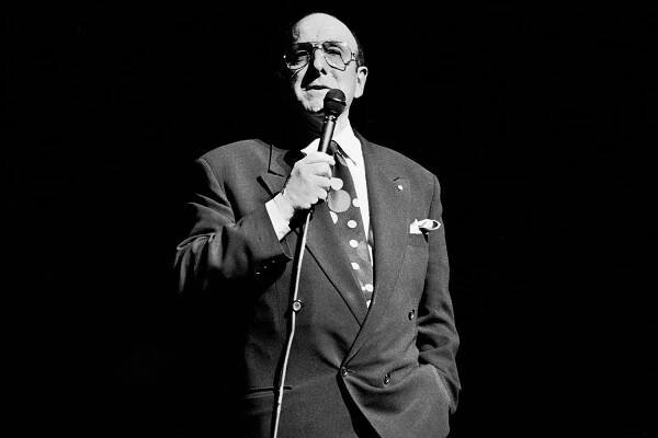 Arista Records founder and CEO Clive Davis speaks onstage at the Beacon Theatre, New York, New York, May 15, 1991