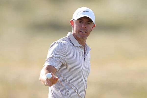 NORTH BERWICK, SCOTLAND - JULY 12: Rory McIlroy of Northern Ireland acknowledges the crowd on the 12th green on day three of the