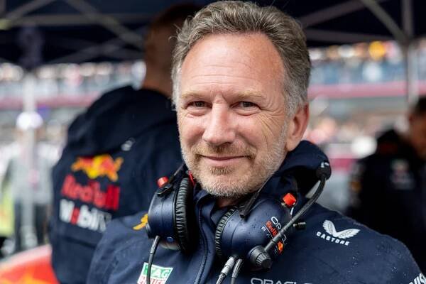 Christian Horner, Red Bull Racing Team Principal, wearing headphones.