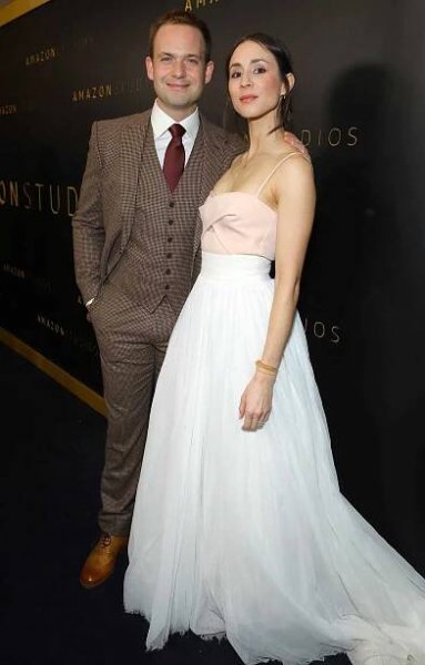 Patrick J. Adams and Troian Bellisario attend the Amazon Studios Golden Globes After Party