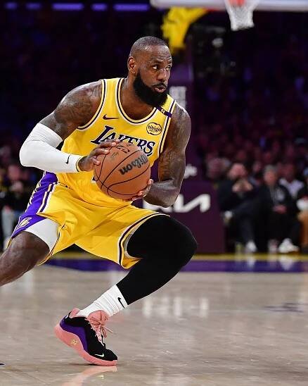 LeBron James picks up $52.6M option to remain with Lakers