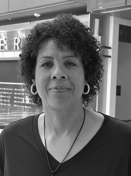 Headshot of Cheryl Miller with a content smile.