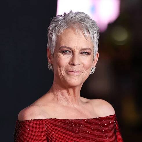 Who are Jamie Lee Curtis' famous Hollywood parents who influenced her career?