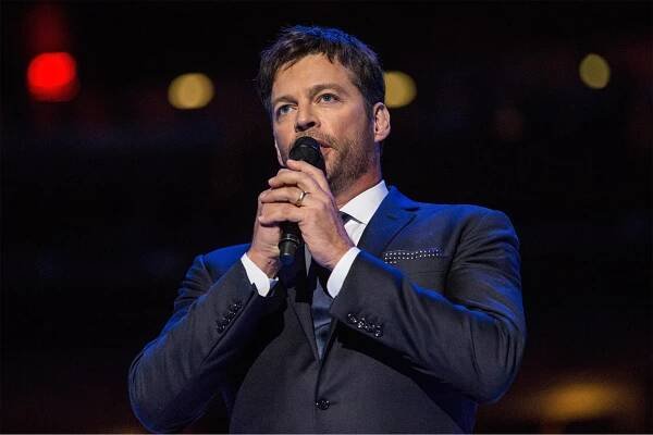 Singer Harry Connick Jr. takes the mic.