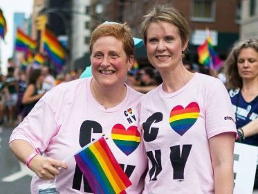 Christine Marinoni (L) and Cynthia Nixon attend the 2018 New York City Pride March on June 24, 2018 in New York City