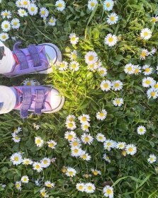 The littlest feet and hand-me-down sneakers from his big sis. 💜🌼