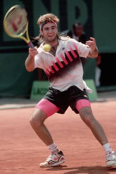 Image may contain Andre Agassi Clothing Footwear Shoe Ball Sport Tennis Tennis Ball Person Accessories and Jewelry