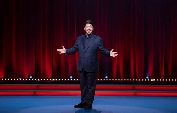 Comedian on stage.