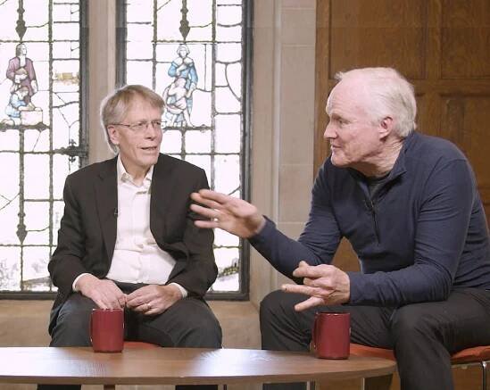 Photograph of Lars Peter Hansen and Kevin M. Murphy being interviewed
