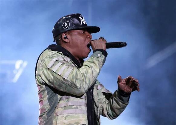 Rapper Jay Z performs at the Hackney Weekend festival at Hackney Marshes in east London 
