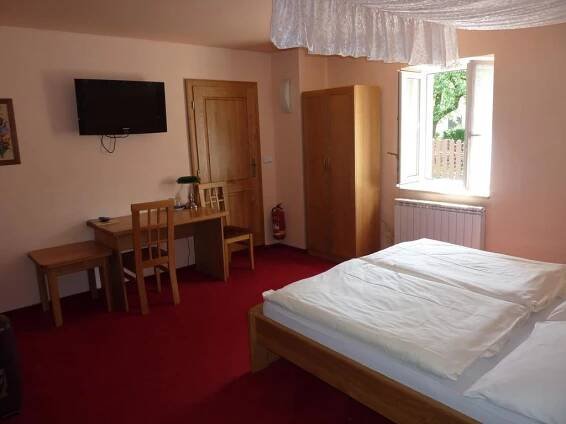 Postel nebo postele na pokoji v ubytování Hotel & Restaurant Na Fryštátské
