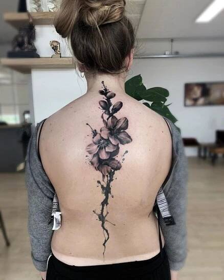 50+ of the Coolest Spine Tattoo Ideas Ever - KickAss Things | Scars tattoo cover up, Spine tattoos for women, Cover up tattoos for women