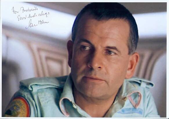 Legendary actor Ian Holm in his iconic role as Ash in the movie Alien. Wallpaper