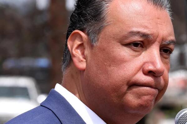 U.S. Sen. Alex Padilla speaks to the media.