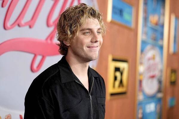 Lukas Gage Makes First Public Appearance Since Chris Appleton Filed for Divorce via these pics on Getty