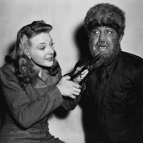 Evelyn Ankers gives Lon Chaney Jr. a long overdue trim