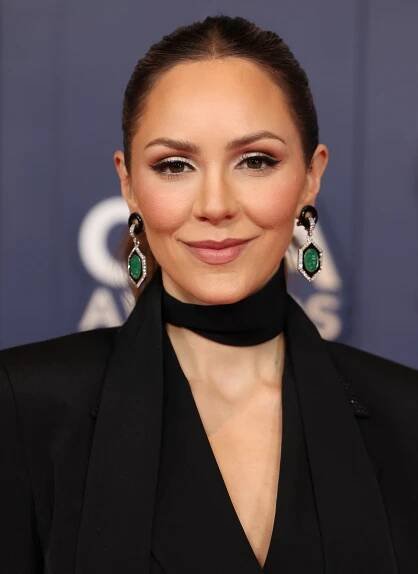 Katharine McPhee poses on the red carpet during the 58th Annual CMA Awards, in Nashville