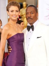 Eddie Murphy and Paige Butcher attend the 87th Annual Academy Awards on February 22, 2015 in Hollywood, California. 
