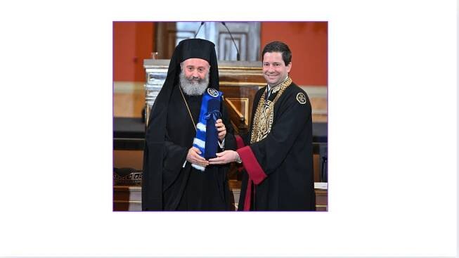 His Eminence Archbishop Makarios of Australia receives the title of doctor honoris causa of the School of Theology