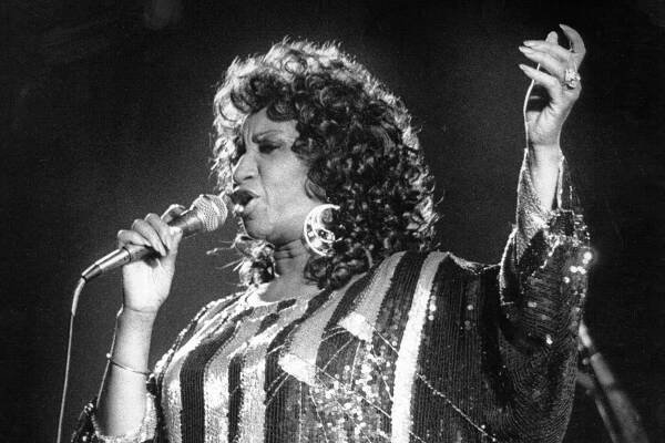 Cuban salsa singer Celia Cruz (1924 - 2003) performing in 1980. (Photo by David Corio/Michael Ochs Archives/Getty Images)