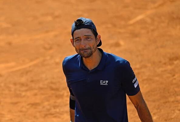 Marcelo Arevalo of El Salvador celebrating a tennis victory.