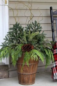 Quick and easy tutorial for making these GORGEOUS winter porch pots. Made in baskets for a farmhouse style, but can be made in urns for a more formal look!