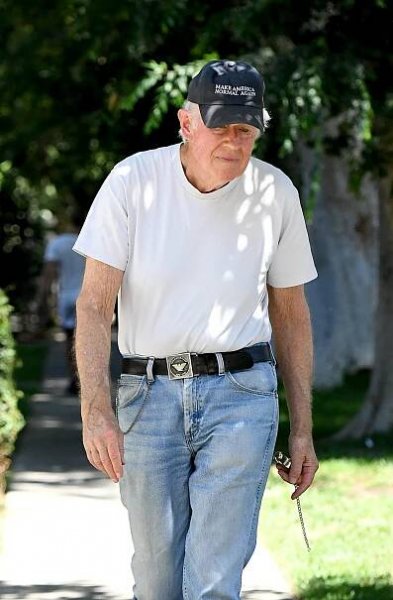 Beloved M*A*S*H actor Michael Farrell, 86, makes his political feelings plain as he is spotted running errands in an anti-MAGA baseball cap. The veteran actor, who found fame depicting Captain B.J. Hunnicutt on the military themed TV comedy series, was wearing a ‘Make America Normal Again' hat and his belt buckle was emblazoned with the logo of United Farm Workers. He was dressed casually in a white T-shirt, denim jeans and black sneakers. These images were shot on July 25, 2025. 