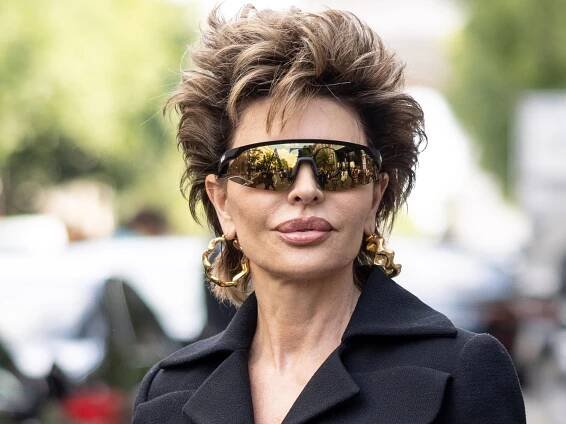 Lisa Rinna Rocks Bodysuit With Leopard-Print Coat At Fashion Week