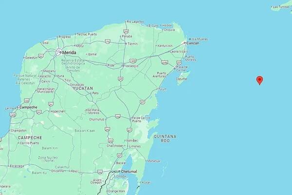 Map of Mexico's Caribbean coast and a red GPS pin showing the location of Tropical Storm Helene