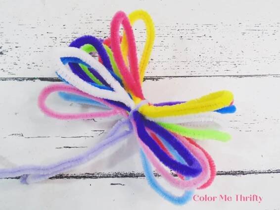 pipe cleaners made into a bow and tied with another pipe cleaner