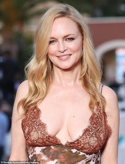 Heather kept her make-up minimal and wore her signature flaxen mane side-parted in waves