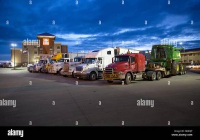 Trucks parked for the night at a motel. Stock Photo