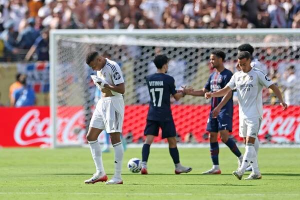 Kylian Mbappé of Real Madrid looking dejected after a soccer game.