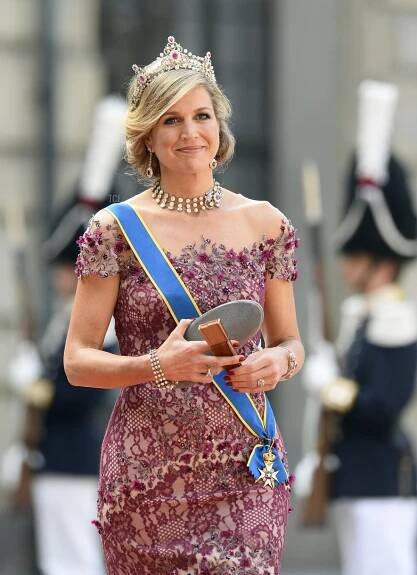 Queen Maxima of the Netherlands arrives for the wedding of Sweden's Crown Prince Carl Philip and Sofia Hellqvist at Stockholm Palace on June 13, 2015