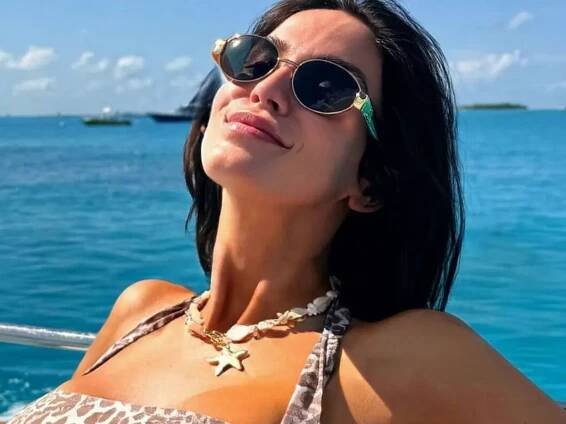 Vicky Pattison looks radiant in a halterneck leopard print swimsuit that’s under £50