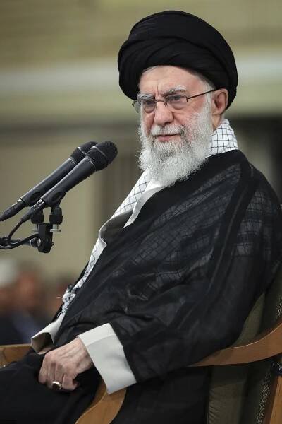 In this photo released by an official website of the office of the Iranian supreme leader, Supreme Leader Ayatollah Ali Khamenei attends a meeting with teachers, in Tehran, Iran, Saturday, May 17, 2025. 