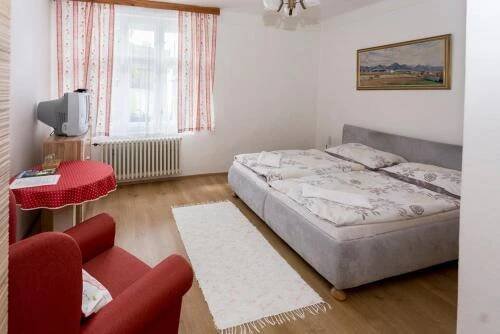 Postel nebo postele na pokoji v ubytování U Hudečků