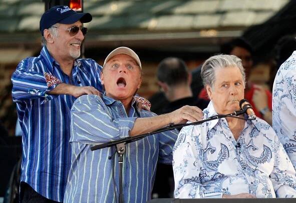 FILE – Original members of The Beach Boys, from left, David Marks, Bruce Johnston and Brian Wilson appear onstage during ABC’s “Good Morning America” summer concert series, June 15, 2012, in New York. (Photo by Jason DeCrow/Invision/AP, File)