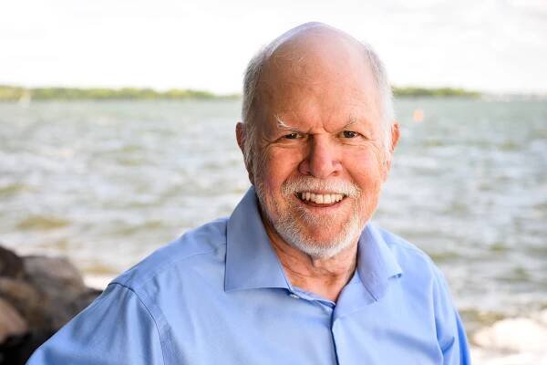 Steve Carpenter, director emeritus of the Center for Limnology and Stephen Alfred Forbes Professor Emeritus in the Department of Integrative Biology, is pictured along the Lake Mendota shoreline near the Hasler Lab of Limnology at the University of Wisconsin–Madison on July 28, 2022. (Photo by Jeff Miller / UW–Madison)