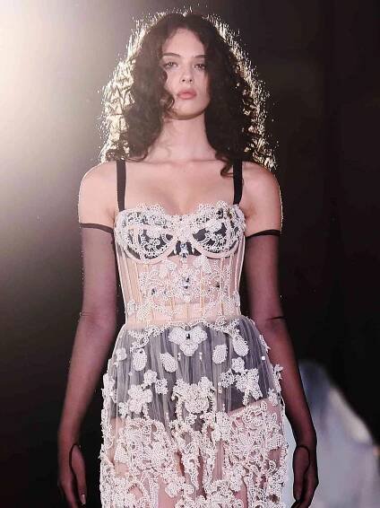 Deva Cassel walks the runway at the Dolce & Gabbana haute couture fall/winter 22/23 event on July 09, 2022 in Siracusa, Italy.