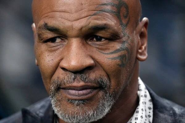 Woman drops lawsuit accusing boxing champion Mike Tyson of 1991 rape