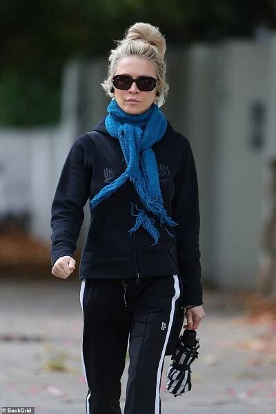 Russell Crowe's ex-wife Danielle Spencer (pictured) was wrapped up for the colder autumn weather as she took a morning walk in one of Sydney's eastern suburbs