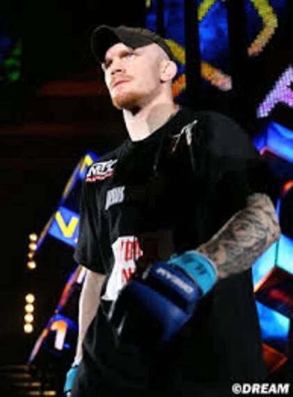 Joachim Hansen preparing to enter the MMA Dream ring Wallpaper