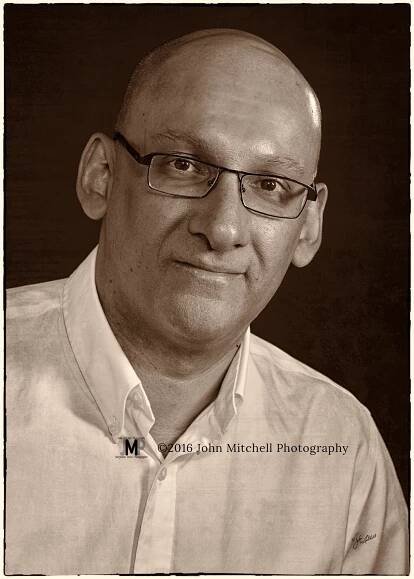 Do you have a well established traditional business? Convey that in a warm tone black and white portrait with a friendly (but not overdone) smile. Look them straight in the eye to reassure them that they can trust you.