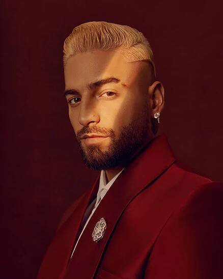 Image may contain Face Human Person Maluma Beard Suit Coat Clothing Overcoat Apparel and Performer