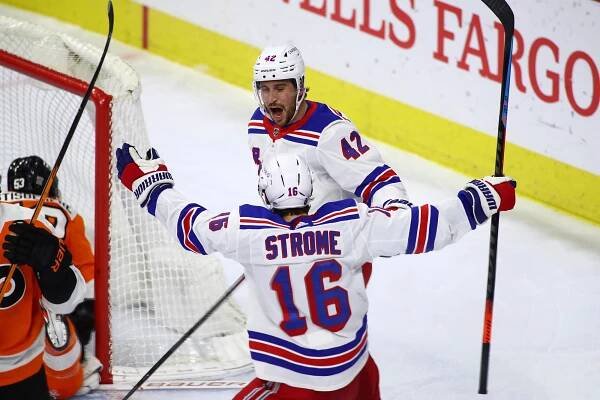 Brendan Smith celebrates his third-period goal with Ryan Strome.