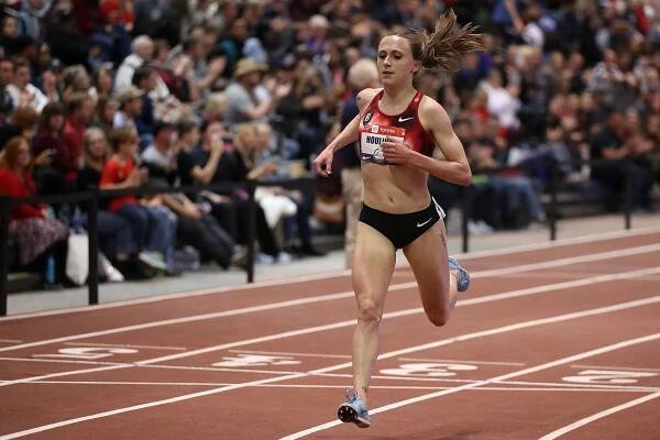 Shelby Houlihan crosses the finish line to win the Women's 3000 M during the 2020 Toyota USATF Indoor Championships.