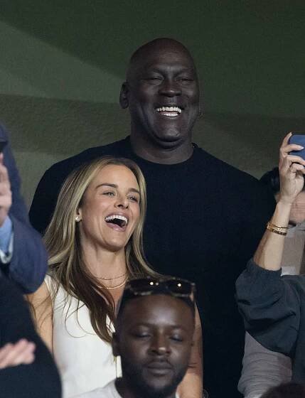 Michael Jordan, Yvette Prieto and Samuel Treves attend UEFA Champions League match AS Monaco vs FC Barcelona at the Louis II Stadium, Monaco